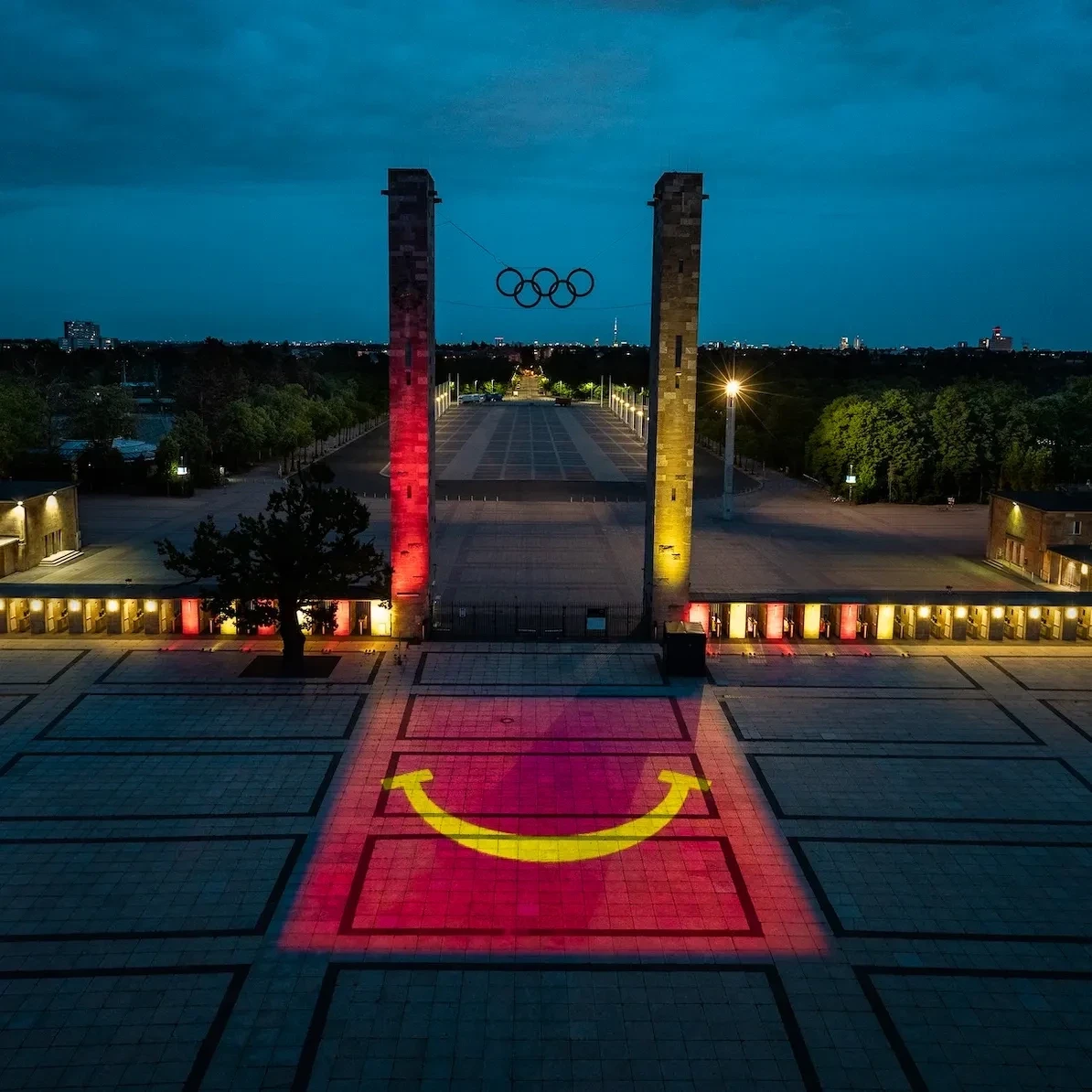 Floor projection of the McDonald's logo in front of the Olympic Stadium in Berlin