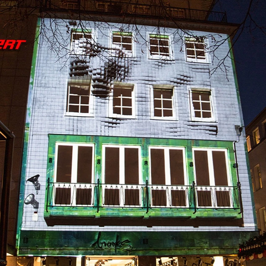 Moving facade surfaces with 3D cubes make Brooks' guerrilla campaign in Bielefeld a success