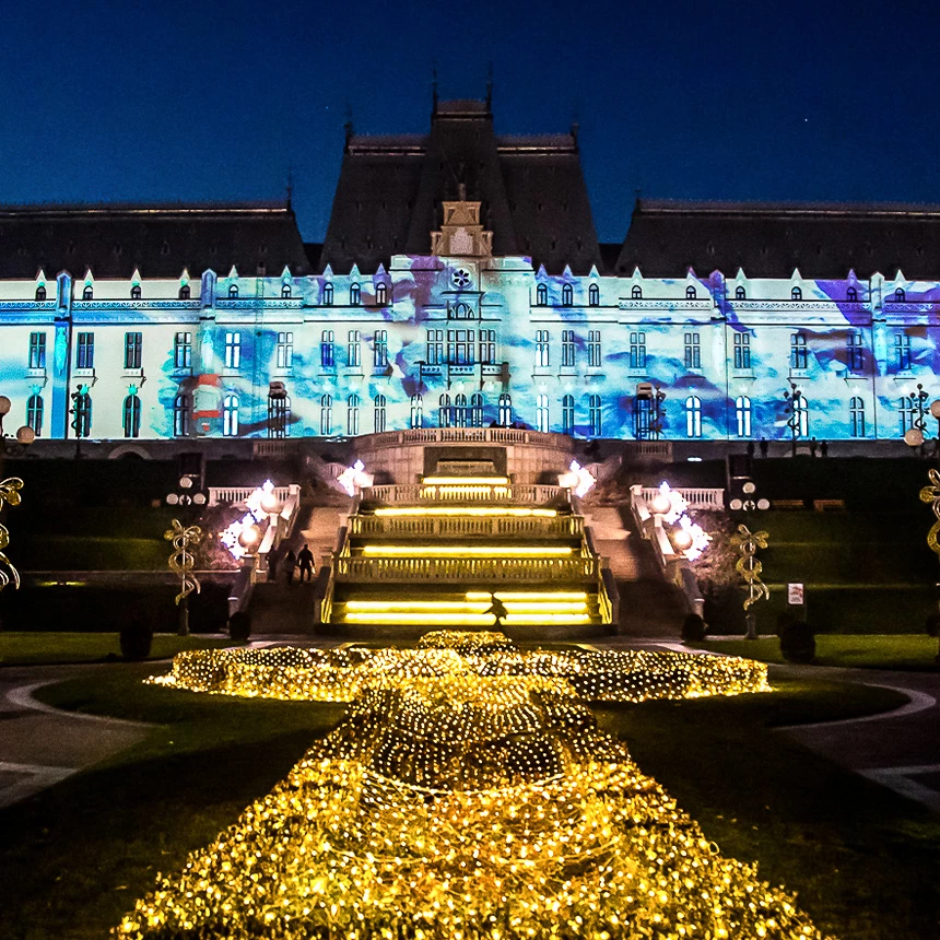 The facade of the Iasi Castle is atmospherically illuminated in blue colors
