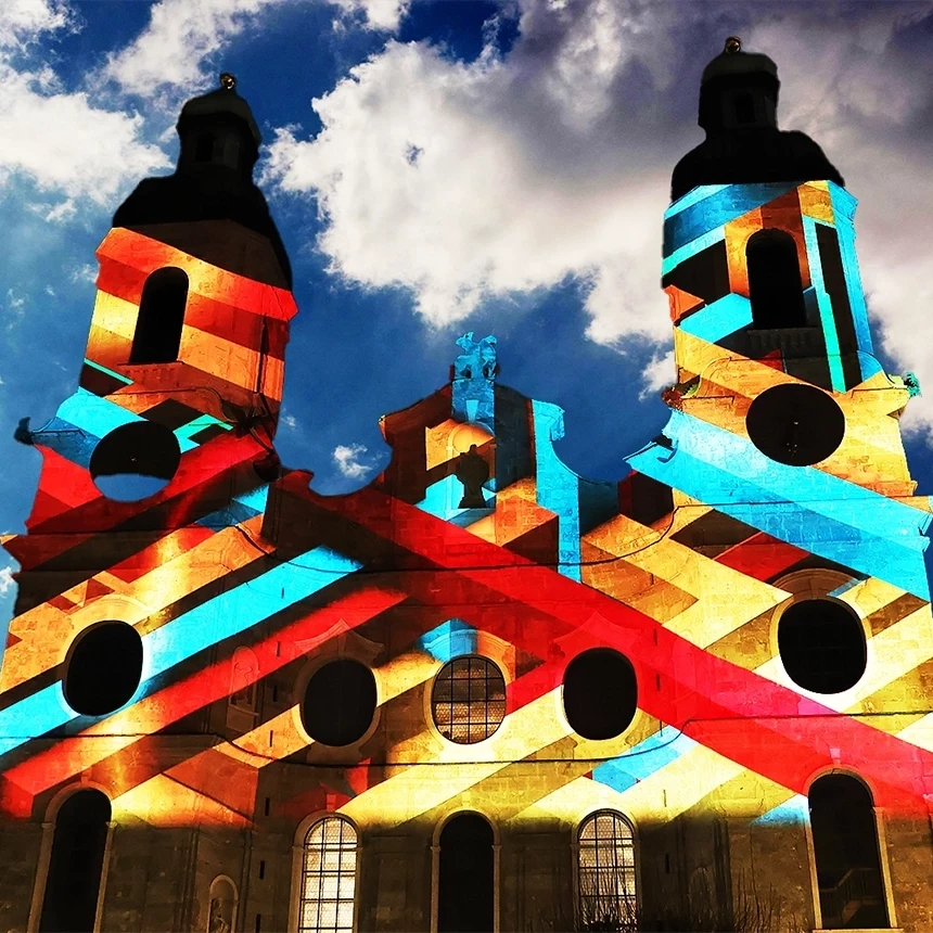 The facade of the cathedral in Innsbruck is decorated with a facade projection with colorful stripes