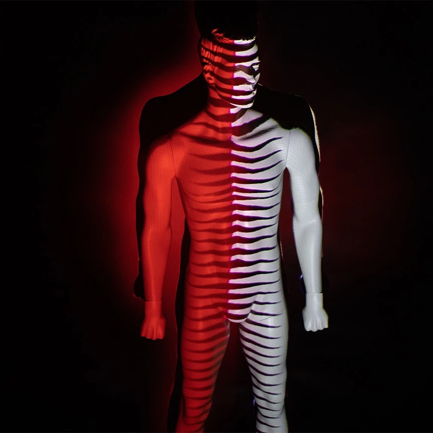 Projection mapping for product presentation shows stripes on a mannequin at the Gore stand at Eurobike