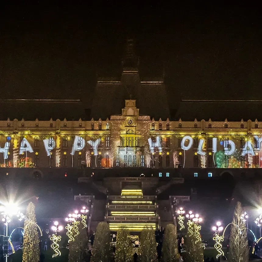 Atmospheric projection show with Happy Holiday lettering