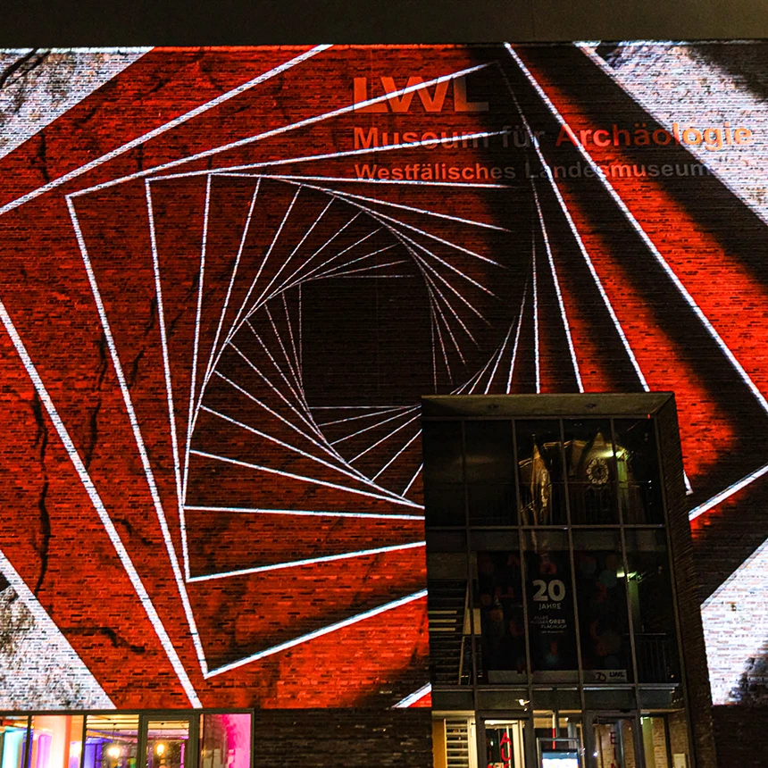 A 3D tunnel as an optical illusion can be seen in a 3D video mapping at the LWL Museum for Archeology and Culture in Herne
