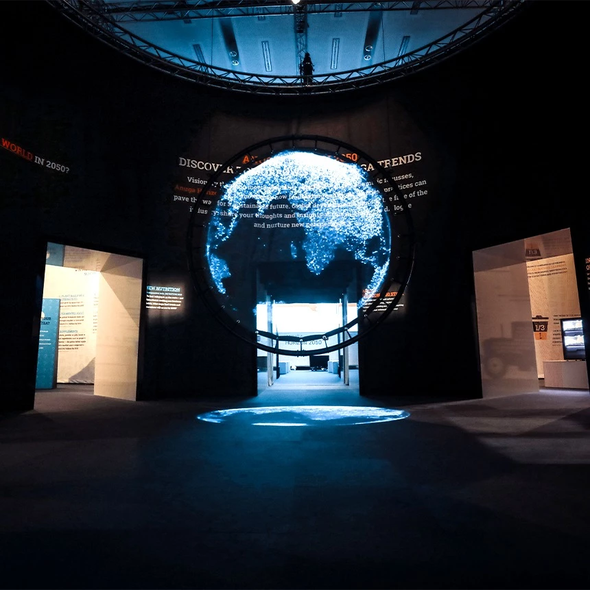 3D projection of a particle-look globe onto a round holo-screen during the Anuga trade fair in Cologne