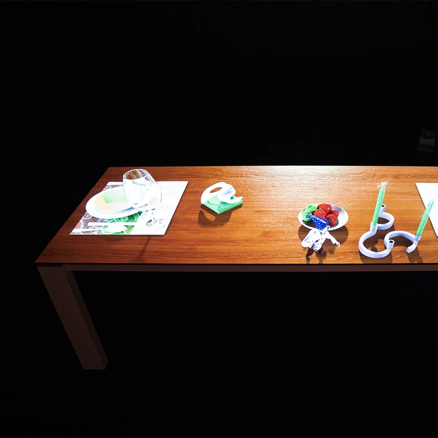 Furniture mapping: through project-specific projections, the exhibited item appears in virtual reality as a set table
