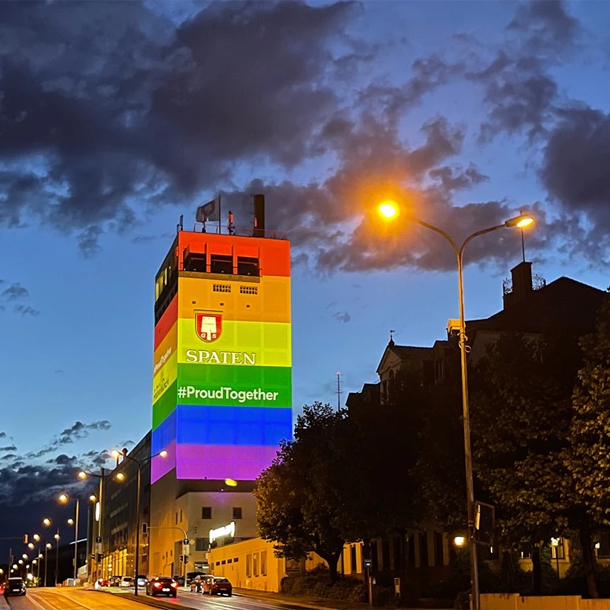 Rainbow projection on the brewery tower with logo and hashtag for the European Football Championship in Munich