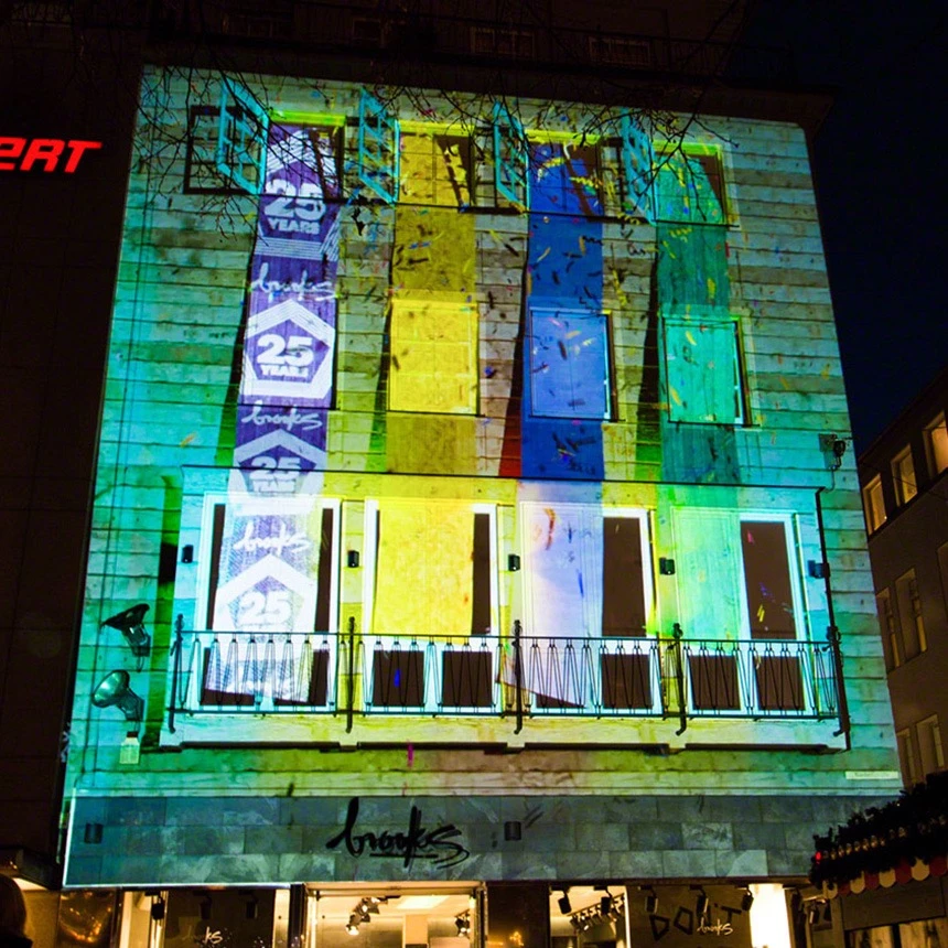Marketing campaign for the anniversary with a colorful facade projection