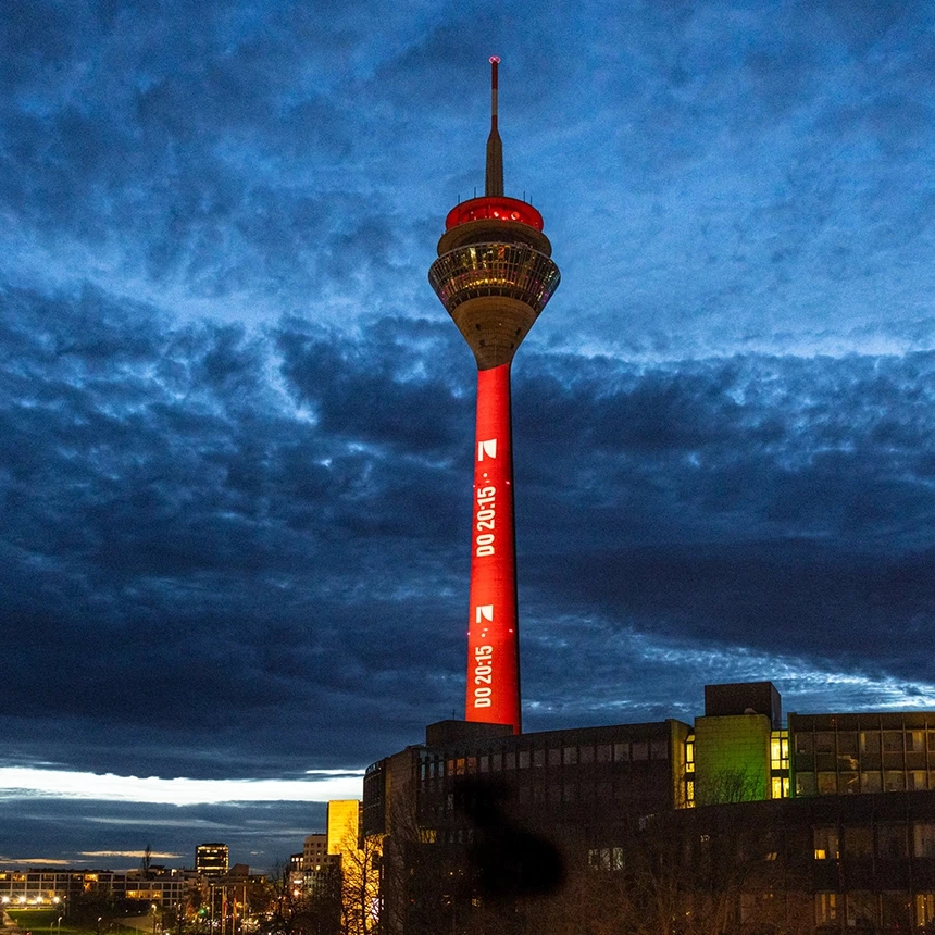 Large-scale announcement of the broadcast time of Germany's Next Top Model on the Rhine Tower: Thursday 8:15 p.m. in red with the ProSieben logo
