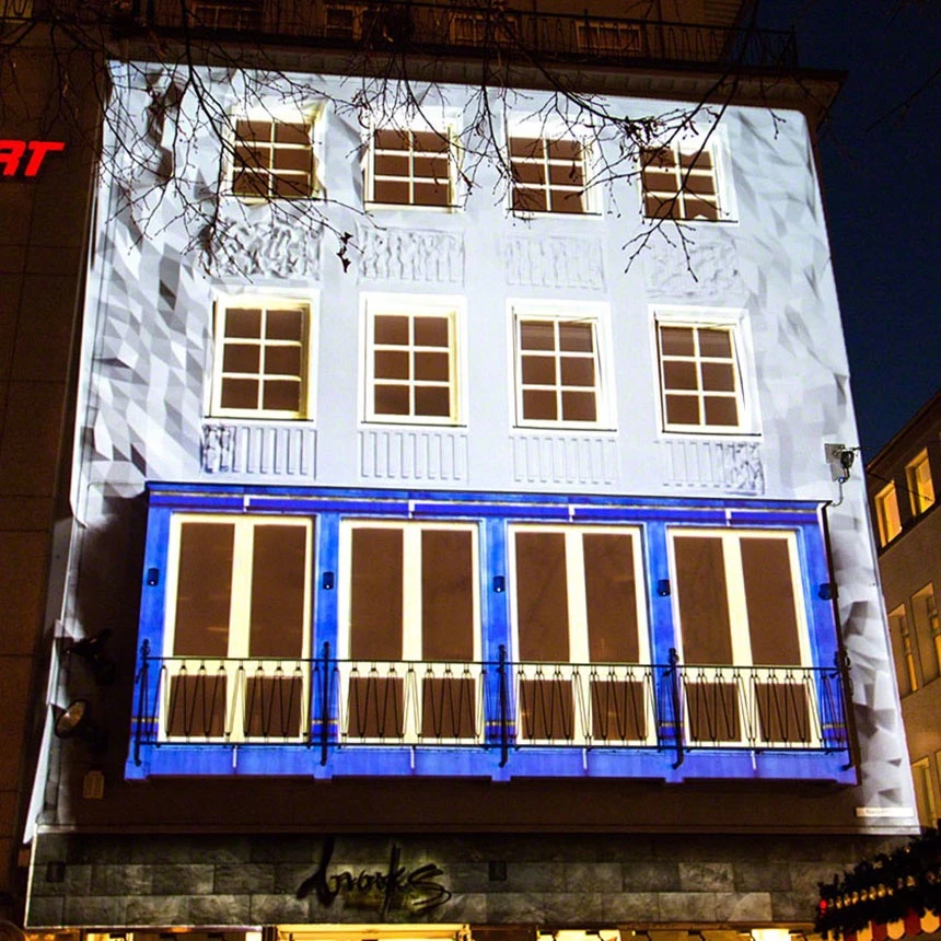 Guerilla projection with building-specific effects on the retail business in Bielefeld