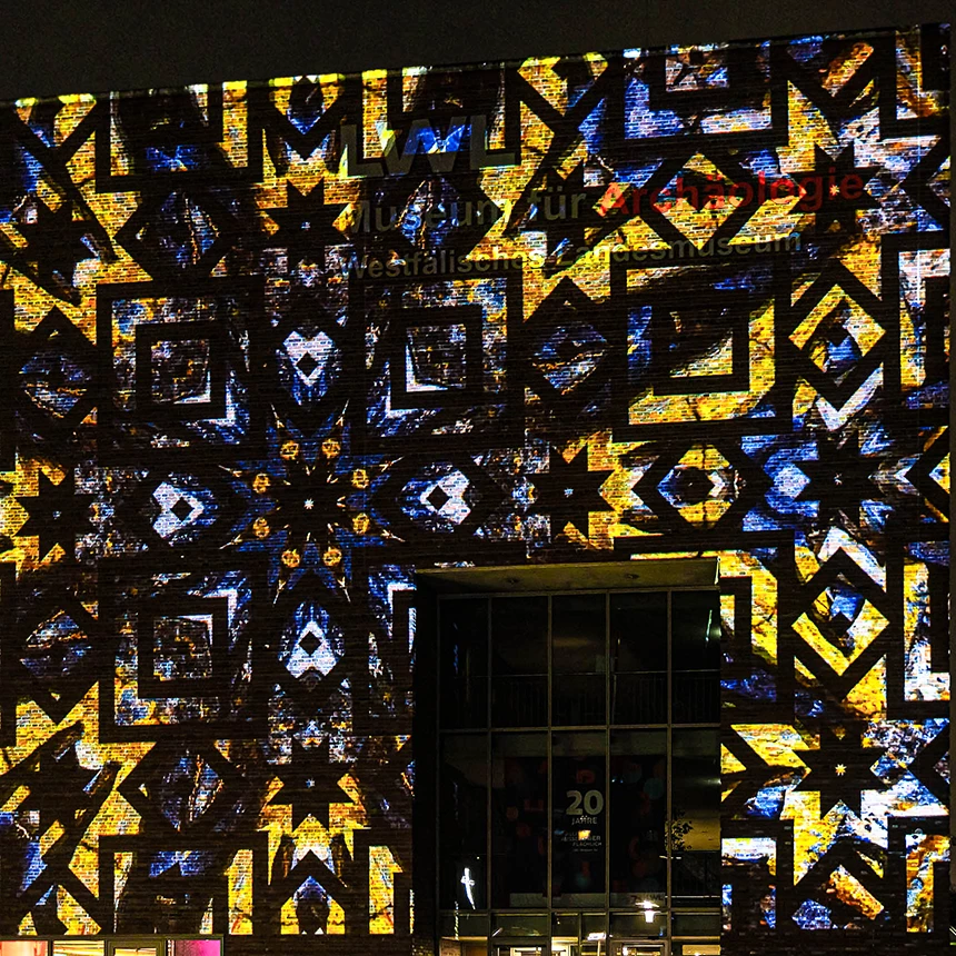 Mosaic structures as a building projection at the LWL Museum for Archeology and Culture in Herne