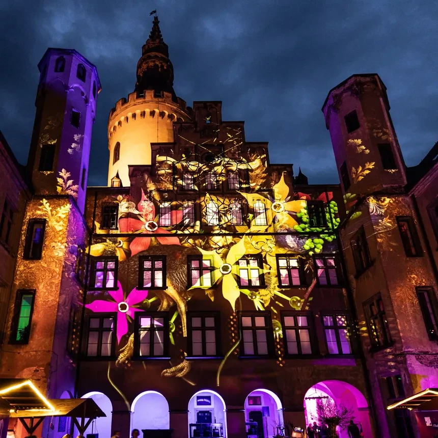 Floral motifs adorn the exterior of Arenfels Castle in a 3D projection show