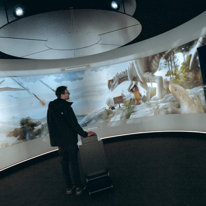 The 360-degree projection is viewed by a museum visitor who stands centrally in the middle of the room and interactively influences the installation.