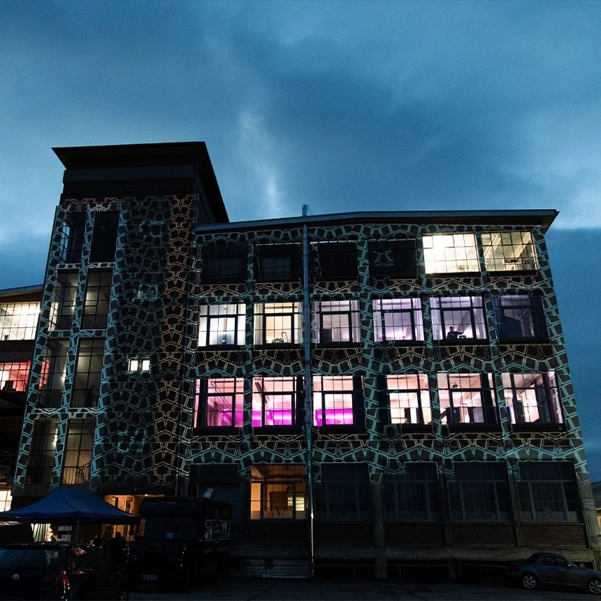 Light artistic facade projection in black and white at the evening event "Overnight" in Neheim
