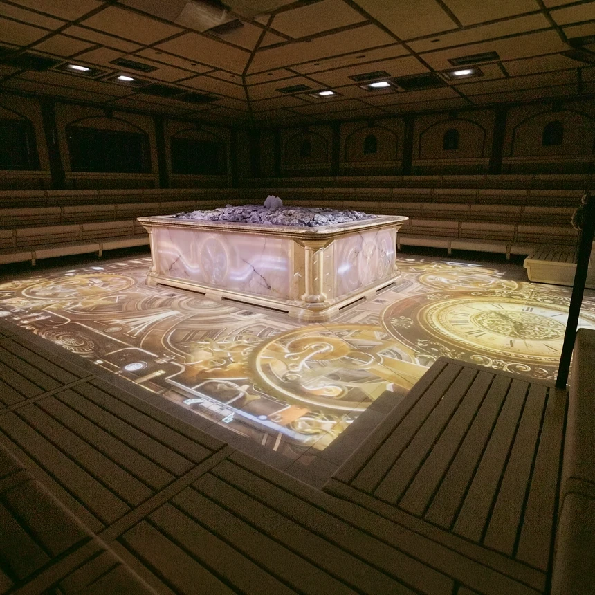 Clockwork meets sauna infusion: TNL GmbH transforms the Crystal Palace using large-scale projections, lighting, and music to create multisensory infusion experiences.