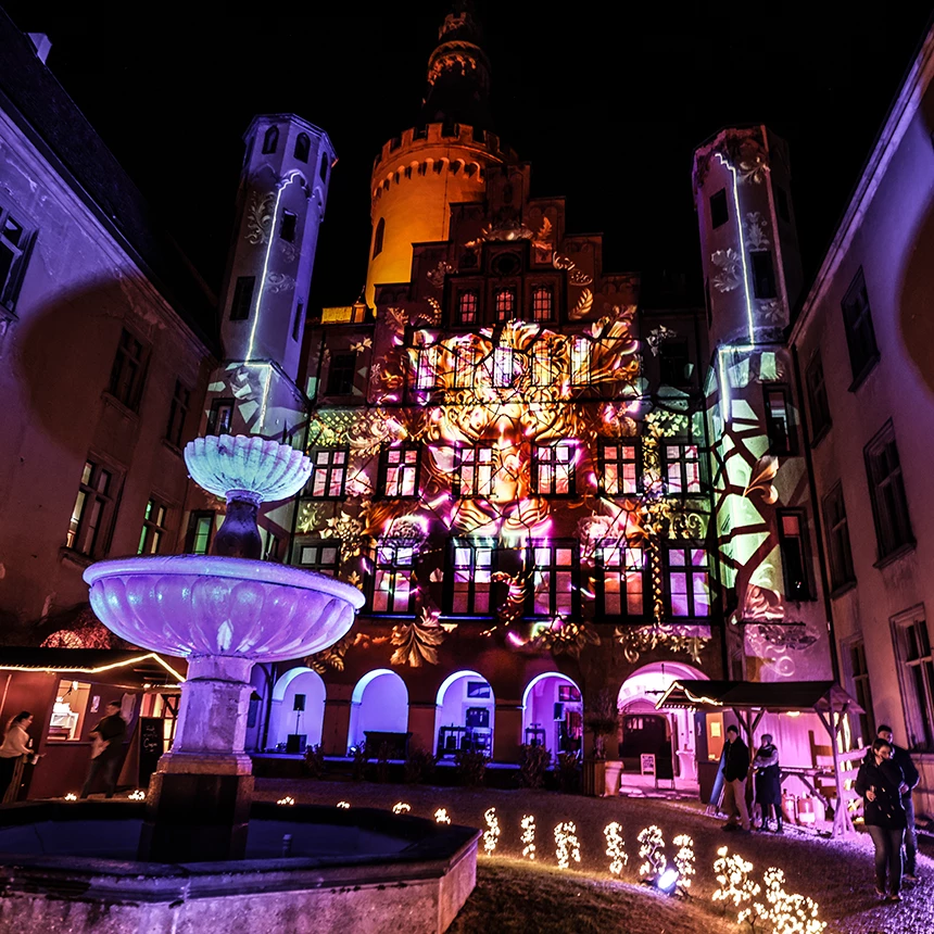 The impressive head of a mythical creature is shown in a projection show on the facade of Arenfels Castle