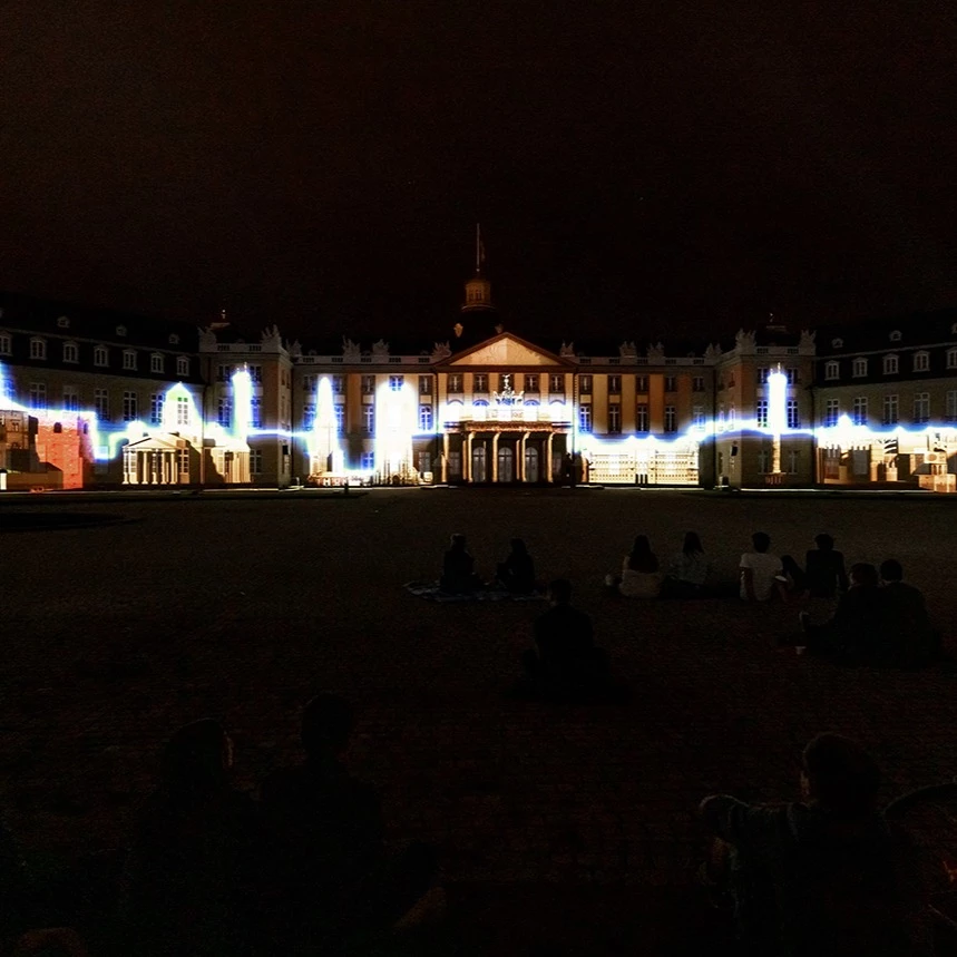3D video mapping on the historic facade of the palace in Karlsruhe with the skyline of Europe